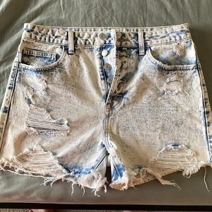 High rise cut off white washed jean shorts. Size large.